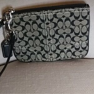 Coach Black Leather Logo Tag Wristlet on Cream Fabric